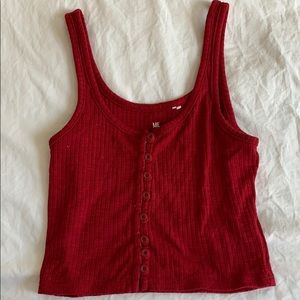 Me to We red tank top